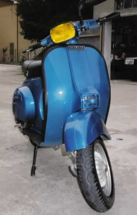 VESPA quella arancio  la mia, quella blu di mio pap, restaurate con le nostre mani. ciao a tutti!!!