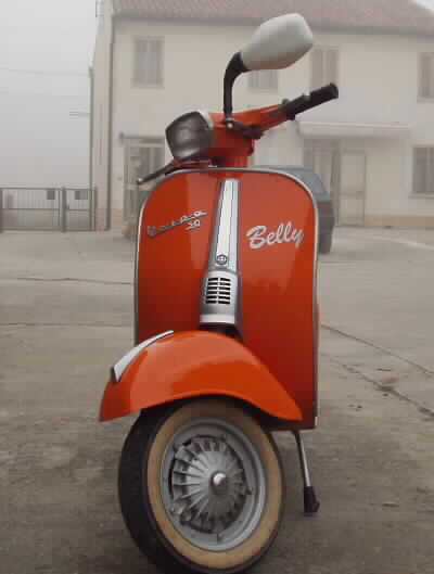 VESPA quella arancio  la mia, quella blu di mio pap, restaurate con le nostre mani. ciao a tutti!!!